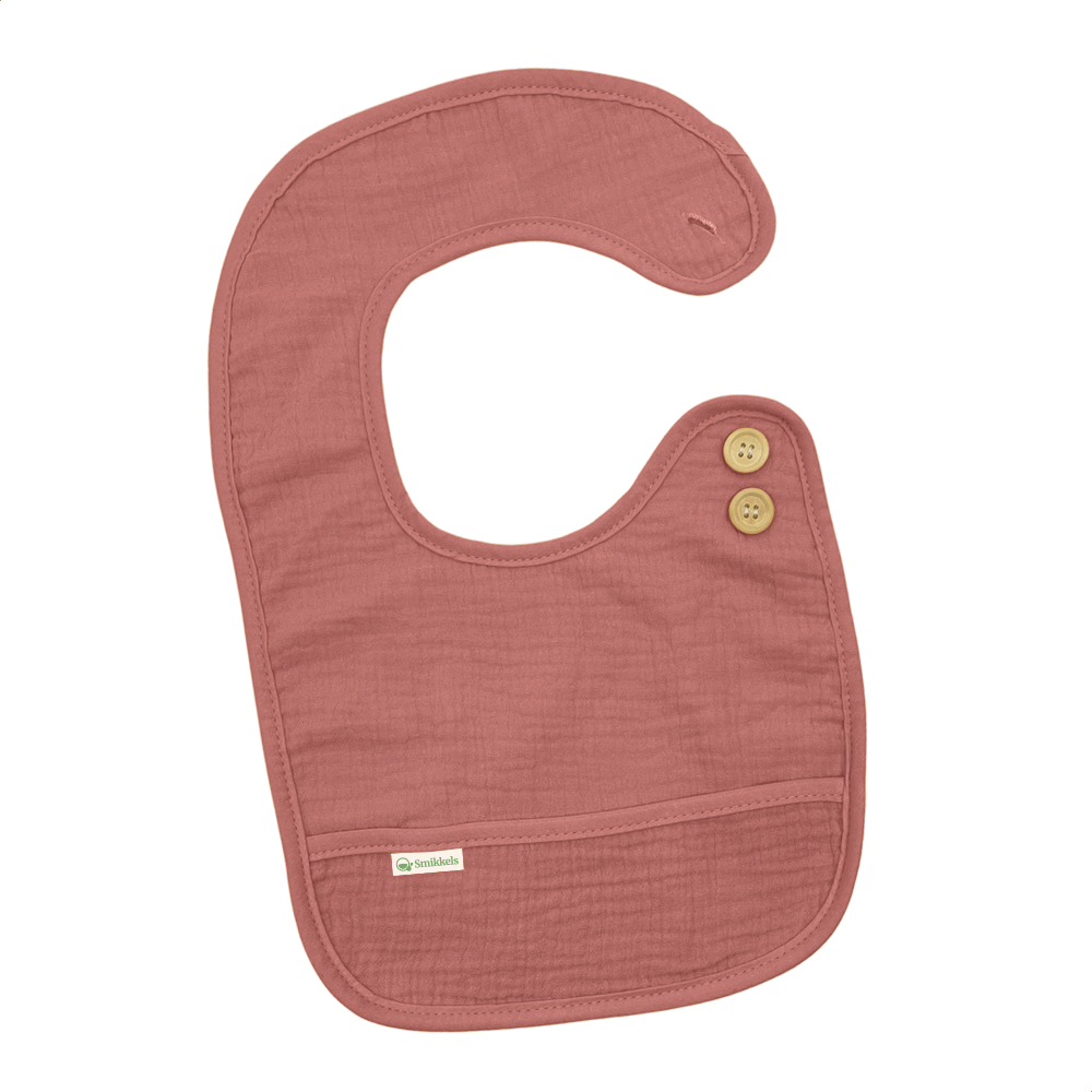 Roze slabbetje L van Smikkels met houten knoopjes, hydrofiele voorzijde en badstof achterzijde